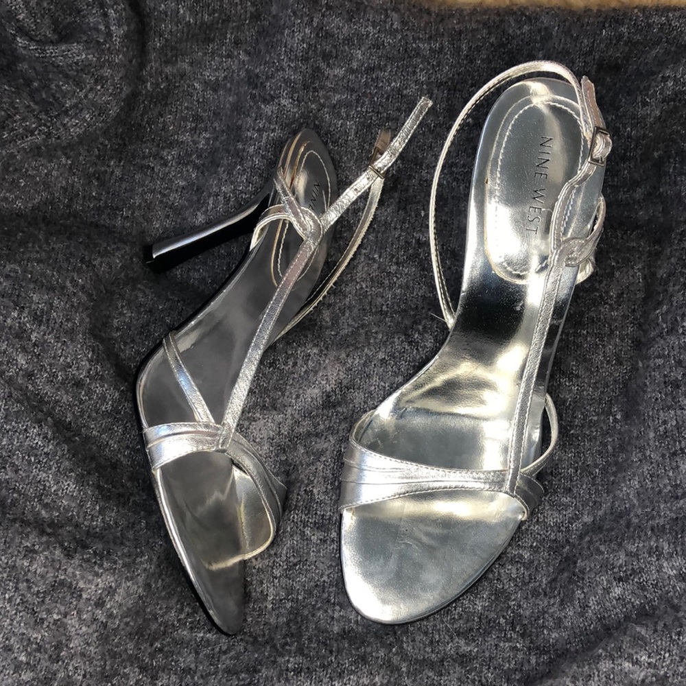 Nine West Silver Sandals, used - worn once, leather sz.8 1/2. 4” spiked heel